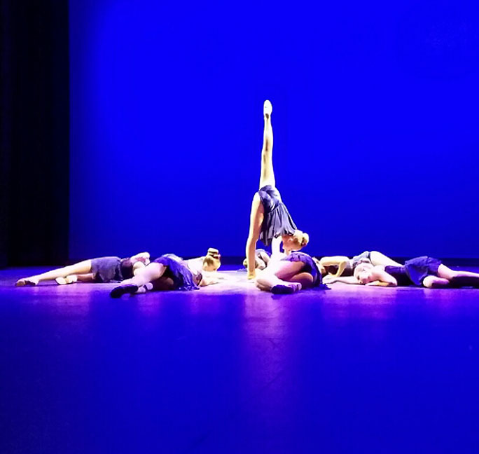 KDA recital on stage