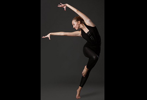 woman stretching in a jump